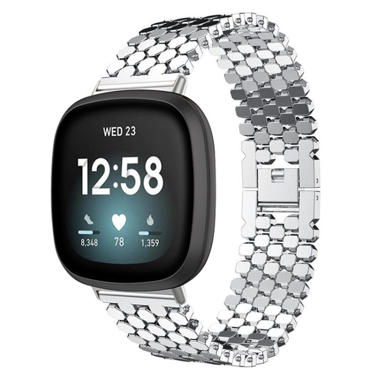 Silver metal fish-scale watch band fitted to a black smartwatch.