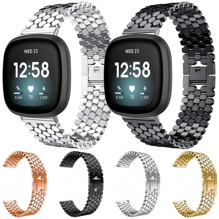 Metal fish-scale watch bands in silver, black, rose gold, and gold, shown fitted and unfastened.