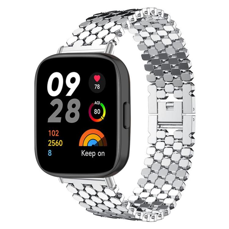 Silver fish-scale metal watch band shown on a rectangular smartwatch