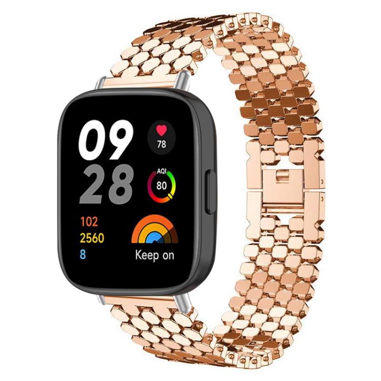 Rose gold fish-scale metal watch band fitted to a rectangular smartwatch