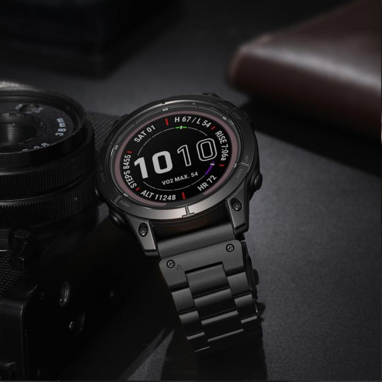 Black Garmin watch fitted with a linked stainless steel band