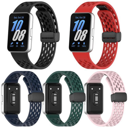 Five perforated silicone watch bands in black, red, navy, dark green, and pale pink