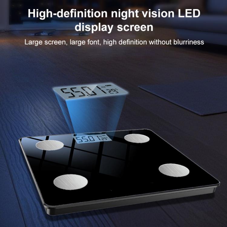 Smart body fat scale with illuminated digits on black glass surface