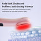 Close-up of pink hot compress eye massager head with glowing warmth ring.