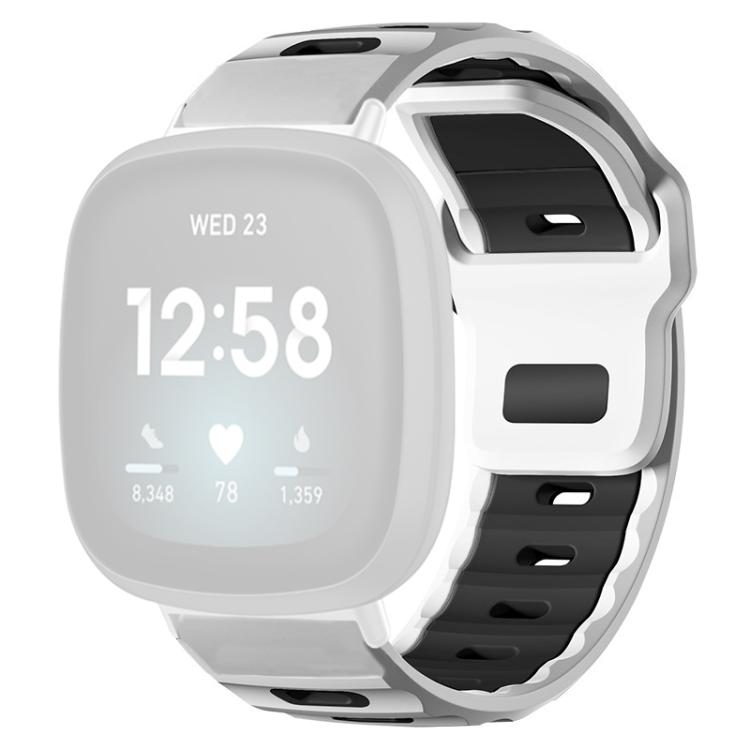 White and black two-tone silicone watch band on a smartwatch