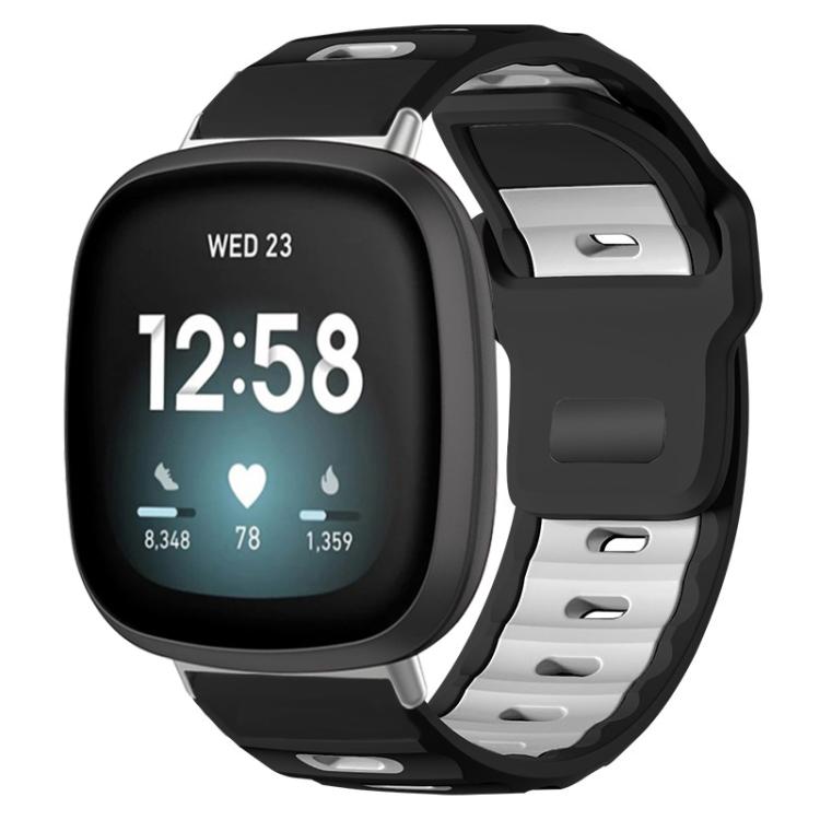 Black and white two-tone silicone watch band on a smartwatch