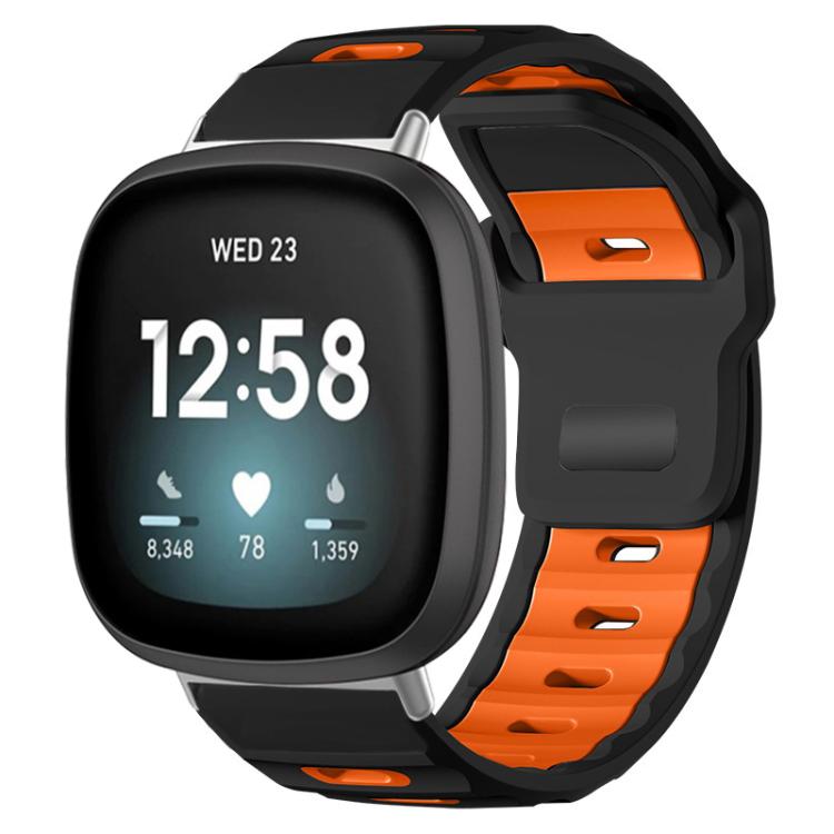Black and orange two-tone silicone watch band on a smartwatch