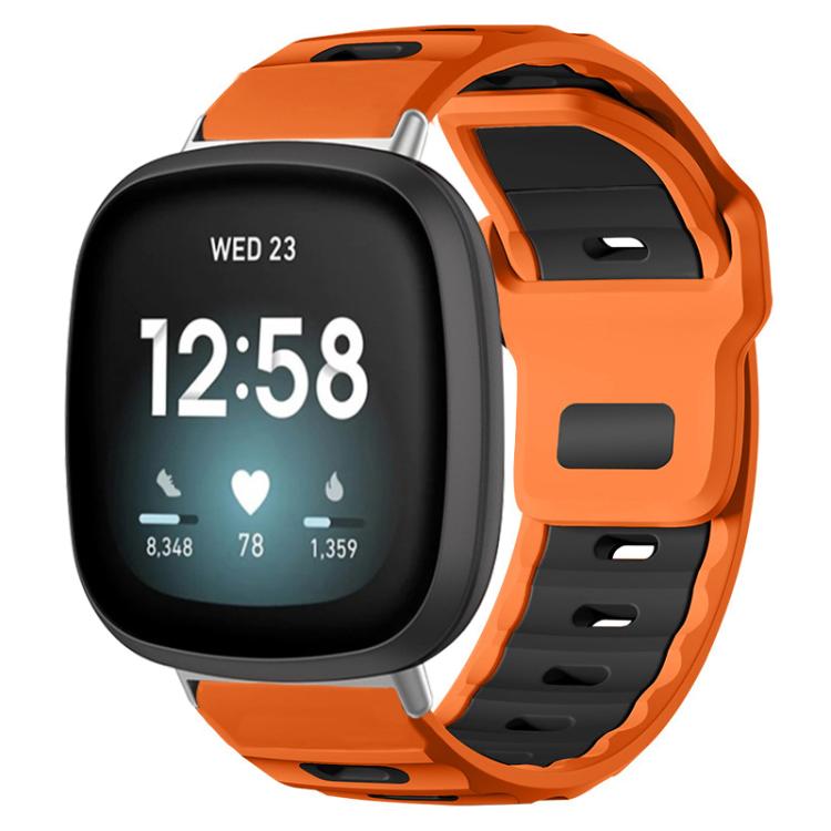 Orange and black two-tone silicone watch band on a smartwatch