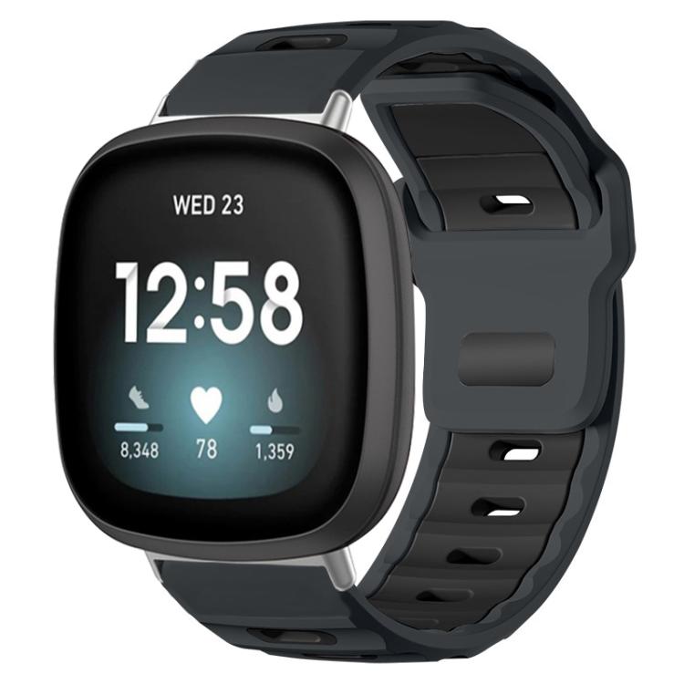 Gray and black two-tone silicone watch band on a smartwatch