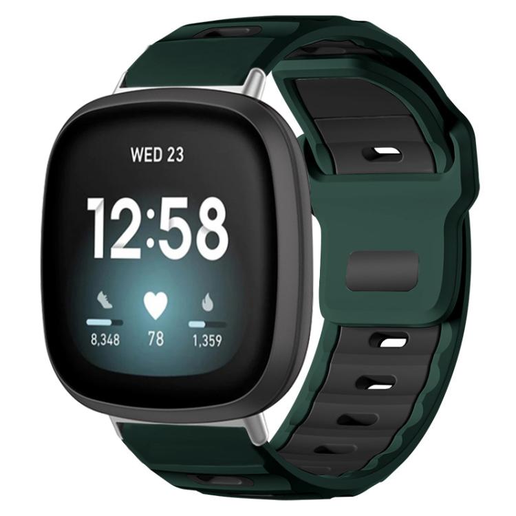 Fitbit silicone watch band in dark green and black, shown fitted to a smartwatch