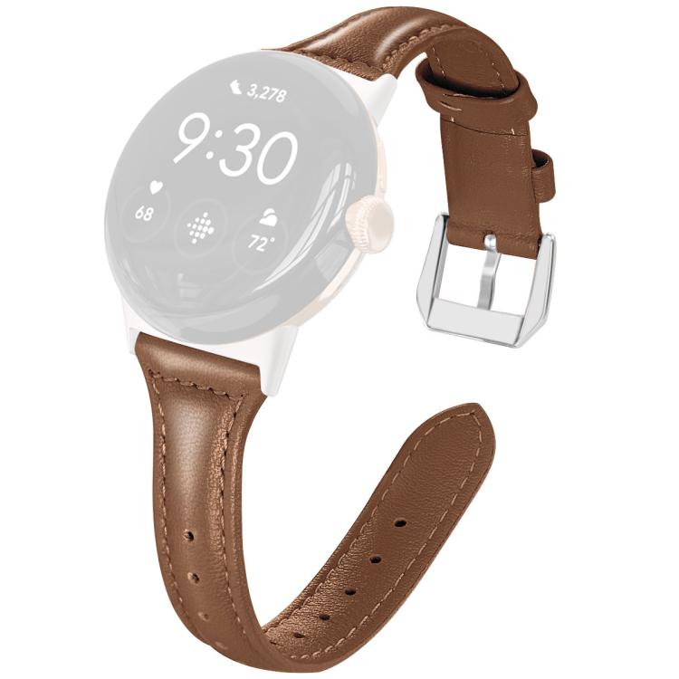 Brown leather smartwatch band with stitched edges and silver buckle, displayed on a faded watch face.