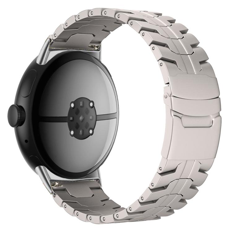 Silver titanium alloy watch band with segmented links and a safety buckle, shown on a watch