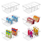 Four-compartment clear storage box with removable divider panels and white slat base