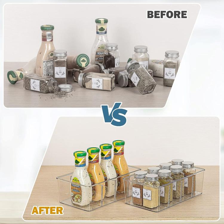 Clear four-compartment organizer with dividers used to neatly store bottles and jars