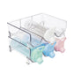 Clear PET bottle organizer rack with pastel dispenser caps and wine bottles