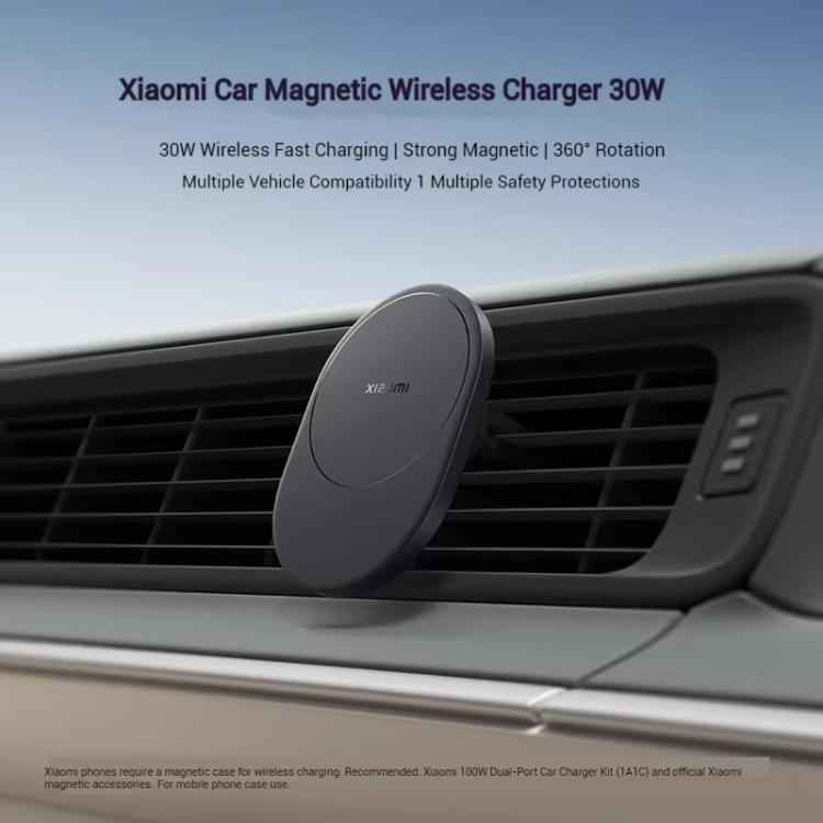 Magnetic wireless car charger mounted on a car air vent
