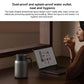 Titanium insulated kettle in silver with black lid on desk near laptop