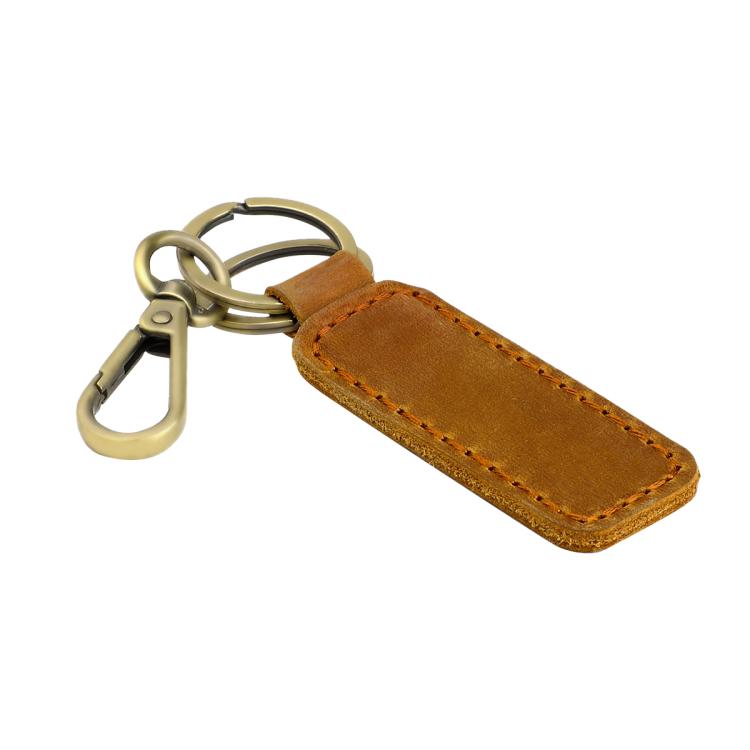 Brown leather car key chain with orange contrast stitching and brass metal clasp