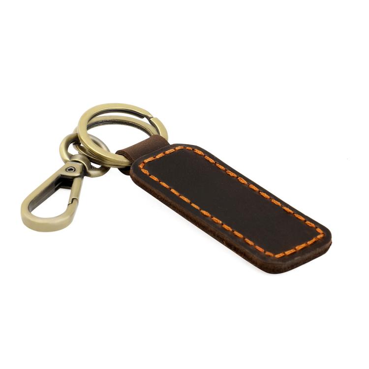 Coffee-brown leather car key chain with orange contrast stitching and brass metal clasp