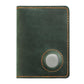 Vintage leather passport card holder in deep green with circular tracker slot and orange stitching
