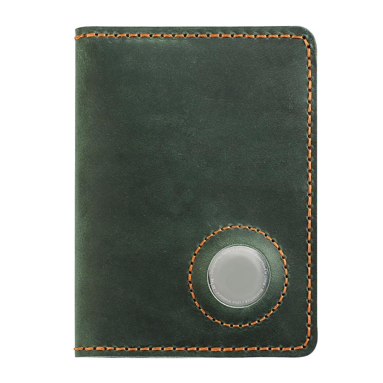 Vintage leather passport card holder in deep green with circular tracker slot and orange stitching