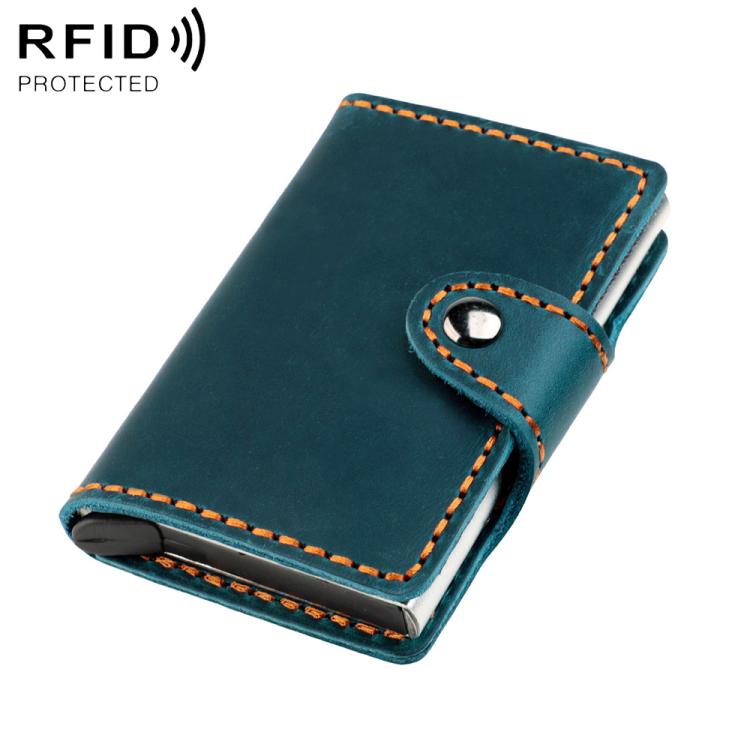 Teal leather card holder with snap strap and orange stitching, slim fold-over case
