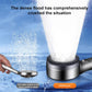 Shower head nozzle spraying a wide water stream from a circular diffuser face