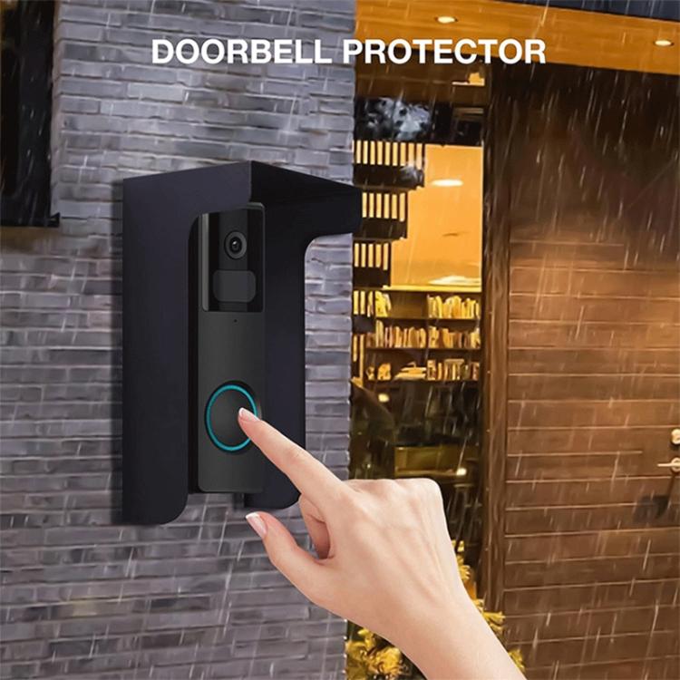 Black doorbell rainproof protector cover over doorbell camera with glowing blue ring