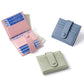 Multicard leather card bags in pink, blue, and green with snap-button closures