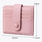 Light pink leather slim card holder with snap buckle and horizontal card slot panel