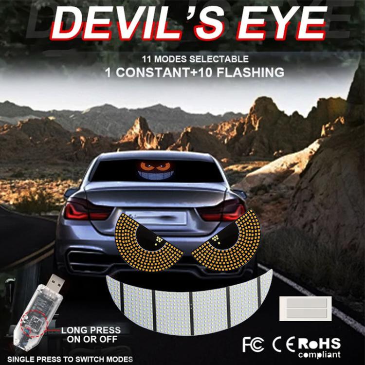 Car LED devil-eye light display showing orange glowing eyes on rear panel