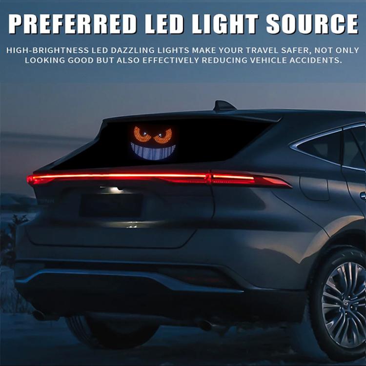 Car LED devil-eye light display with red eyes glowing above taillight bar
