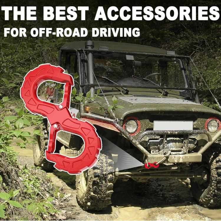 Red S-shaped trailer tow hook with protective frame, connected to recovery strap