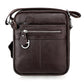 Black genuine leather crossbody shoulder bag with front zip pocket and D-ring detail