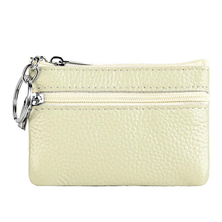 Cream leather zipper key coin purse with metal key ring and double zipper tracks.
