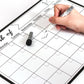 Monthly calendar magnetic refrigerator message board being written on with marker