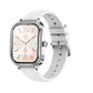 Silver-tone smartwatch with a crystal-accented case and white silicone band