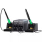 Dual-station soldering station with two green-handled irons and temperature display