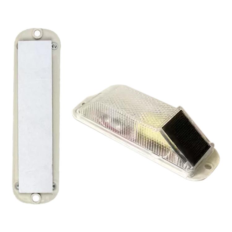 Solar LED warning light with white mount, clear lens and black solar panel