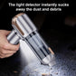 Handheld vacuum cleaner nozzle cleaning debris with visible dust collection canister