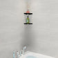 Wall-mounted triangular black corner shelf holding toiletries and a bottle