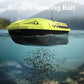 Neon green bait boat with bottom leaky dispenser and visible fish food trail