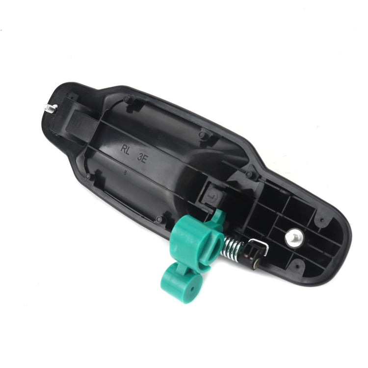 Left rear outside door handle inner side, black shell with green spring clips