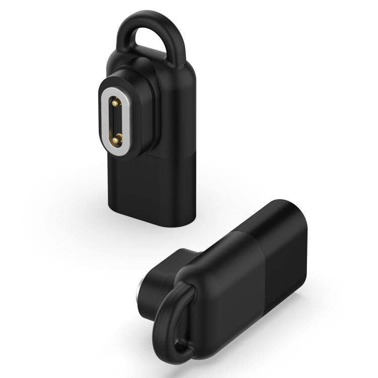 Black watch charging adapter shown from two angles, with a loop and two gold contacts