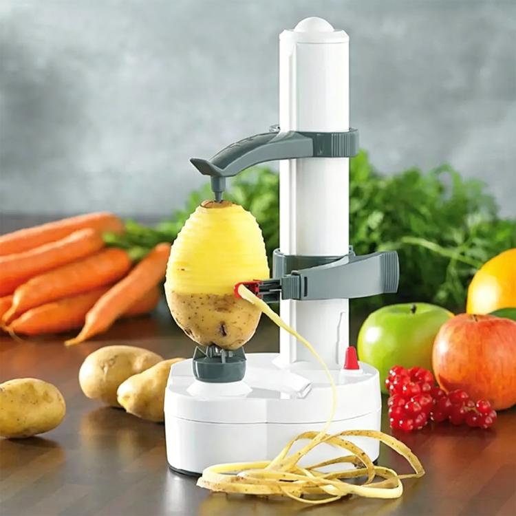 White electric vegetable peeler with potato and spiral peel ribbons