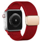Red nylon twill watch band with magnetic buckle shown on a smartwatch