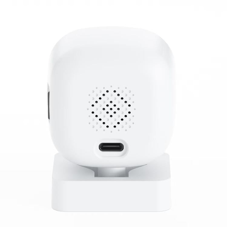 White indoor dome surveillance camera on stand with front speaker grille