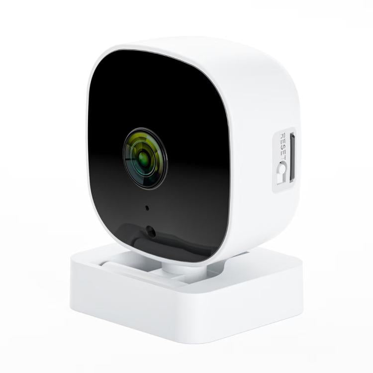White dome-style security camera with wide-angle lens and base stand