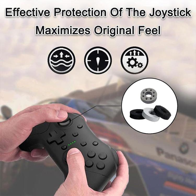 Hand holding a black controller with an inset sponge ring set