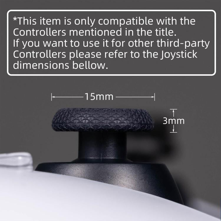 Close-up of black textured thumb grip cap on controller joystick top